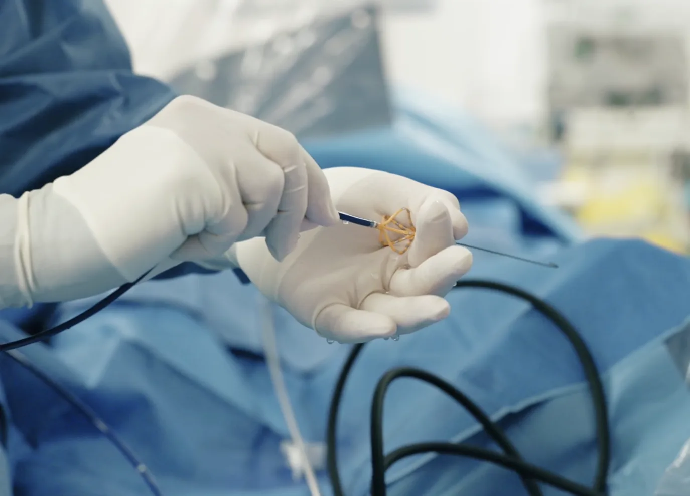 Opening titles from the Boston Scientific docuseries: clinical staff inside chevron shapes, the Boston Scientific EDUCARE logo, then a gloved hand holding a catheter in theatre.