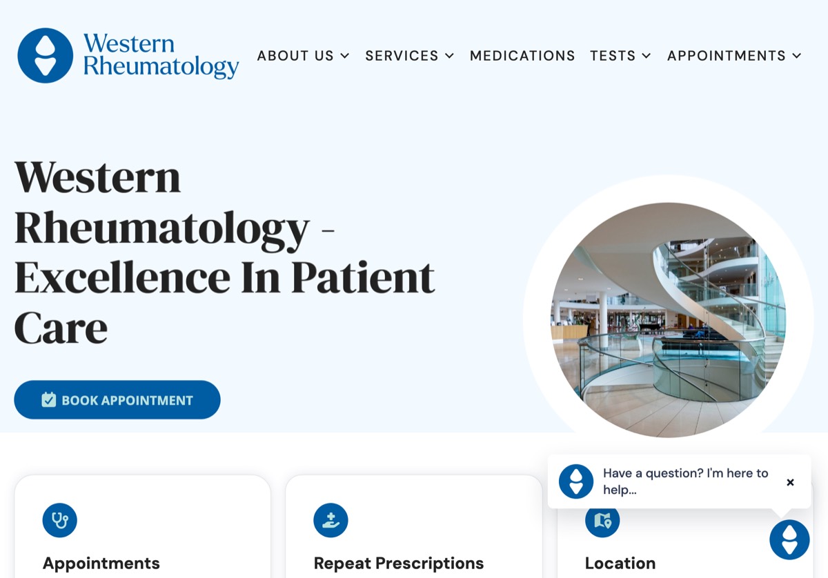 Western Rheumatology homepage with the clinic assistant open. A patient asks where the clinic is located and the assistant answers with its two locations, Blackrock Health Clinic and Bon Secours Hospital.